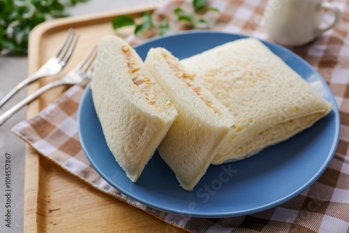 Tuna Mayonnaise Pocket Sandwich in blue ceramic plate 