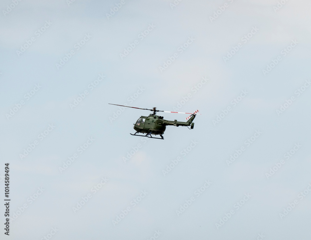 A military helicopter pilot demonstrates the technical skills and capabilities of the helicopter A military helicopter pilot demonstrates the technical skills and capabilities of the helicopter