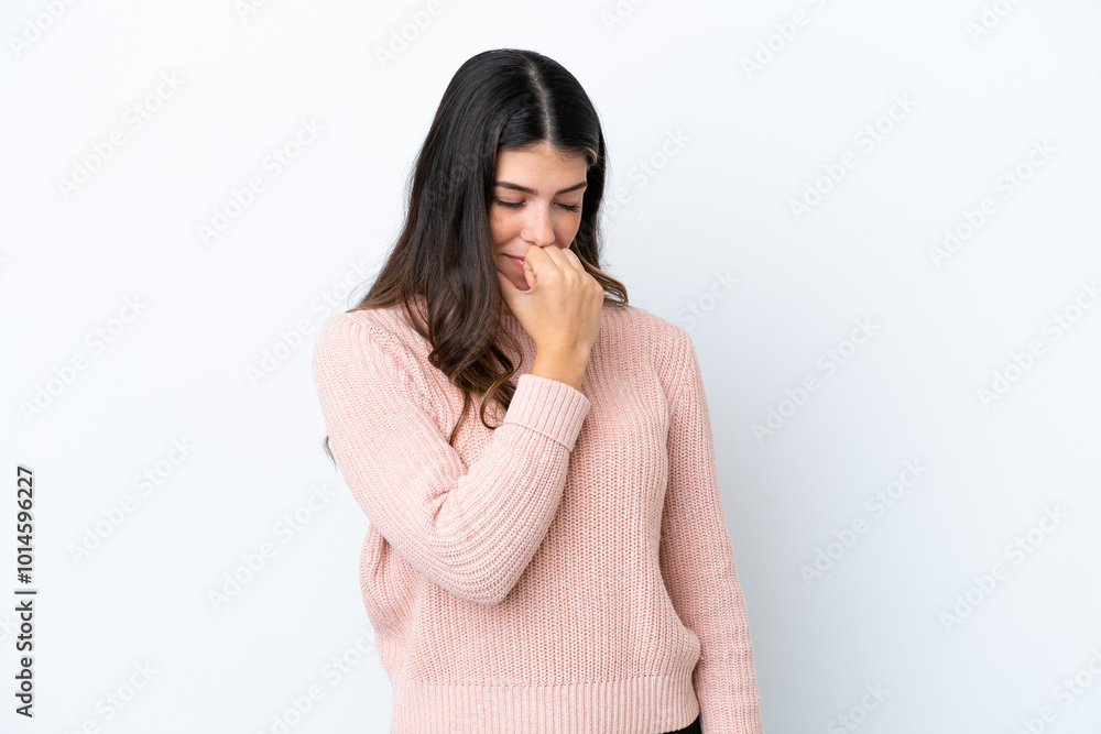 Young Italian woman isolated on white background having doubts Young Italian woman isolated on white background having doubts