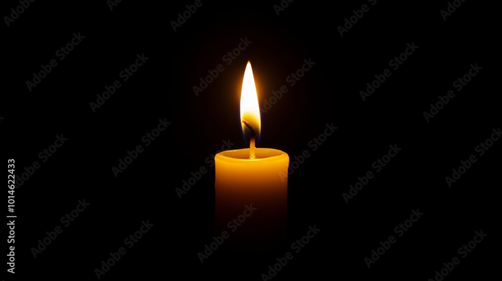 A candle is lit in a dark room A candle is lit in a dark room