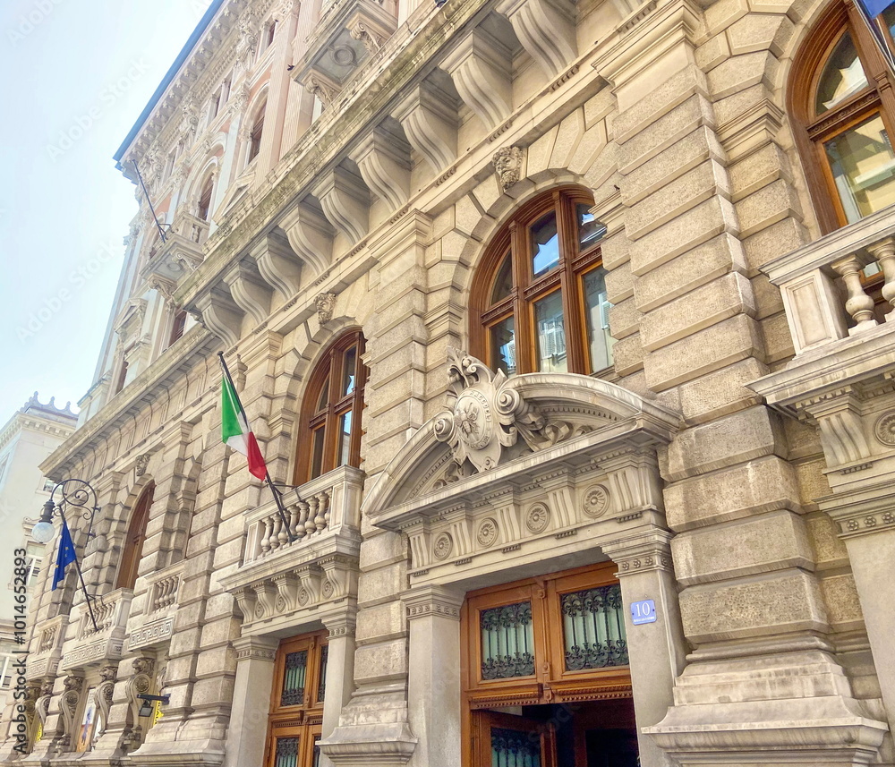Fototapeta premium The unparalleled beauty of the ancient medieval bas-reliefs on the walls of the Trieste Town Hall mesmerizes even a neutral viewer.