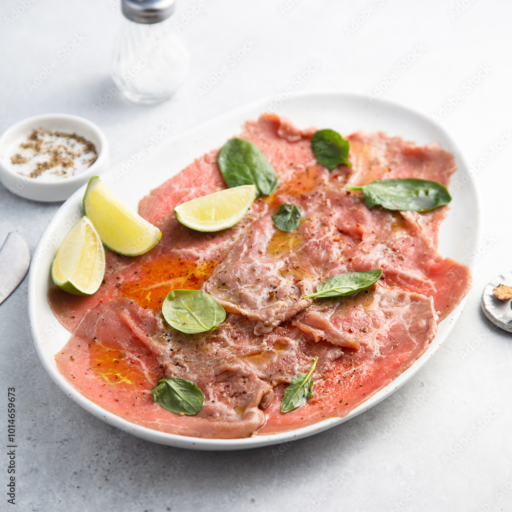 Beef carpaccio with lime and spinach Beef carpaccio with lime and spinach