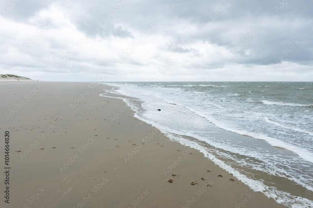 sandy beach in ouddorp, the netherlands, in bad cloudy autumn weather sandy beach in ouddorp, the netherlands, in bad cloudy autumn weather