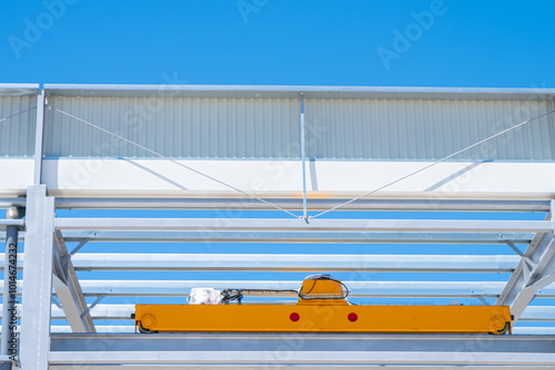 Photography partial view of the metal structure of an industrial building under construction
