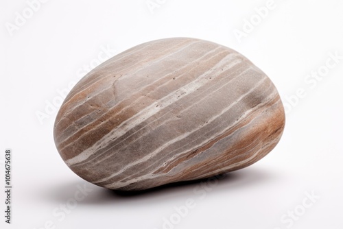 Smooth stone for pressing reflex points Smooth, elegant surface on a white background