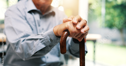 Outdoor, hands and senior person with walking stick for balance, helping and relax in retirement. Closeup, male patient and old man with wooden cane for arthritis, mobility support and osteoporosis