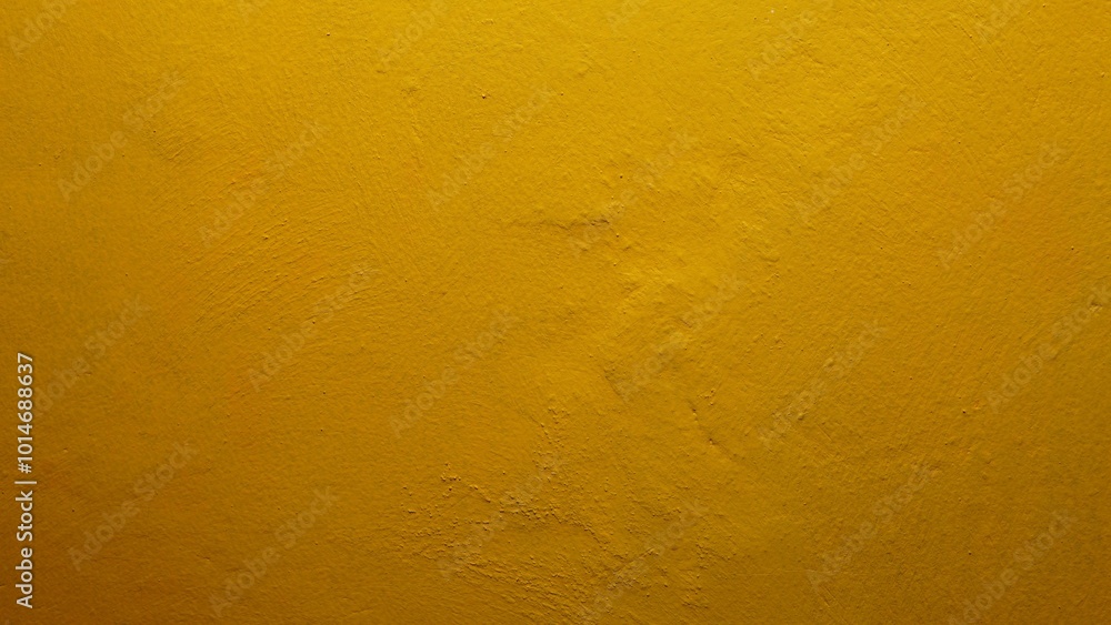 yellow wall texture. The texture background of the wall with yellow paint has a rough surface yellow wall texture. The texture background of the wall with yellow paint has a rough surface