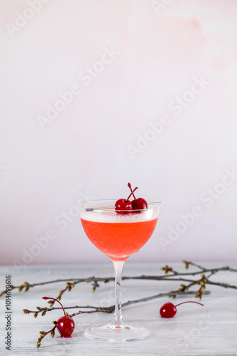 Canvastavla Cocktail glass filled with red alcoholic drink decorated with maraschino cherrie