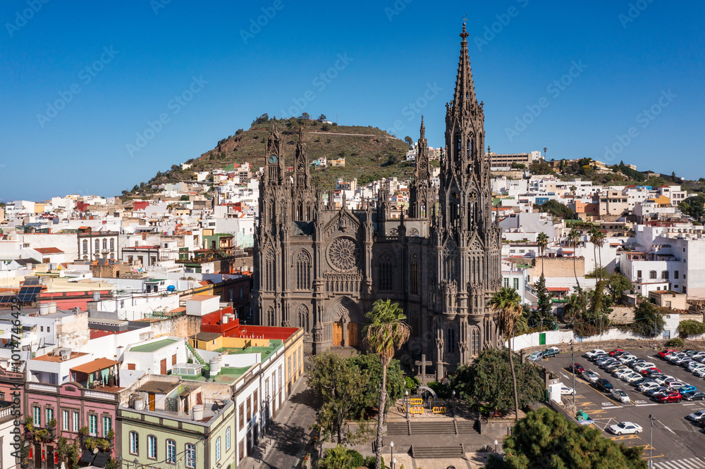 Aerial view of the Parroquia de San Juan Bautista de Arucas church in Arucas town, Gran Canaria, Canary Islands, Spain. Historic Neo-Gothic cathedral in Arucas.