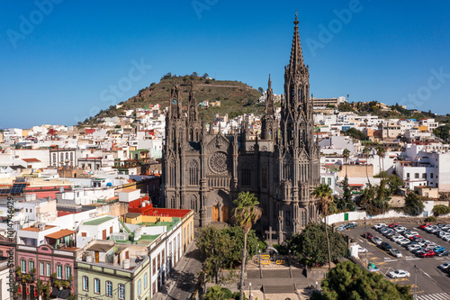 Obraz na płótnie Aerial view of the Parroquia de San Juan Bautista de Arucas church in Arucas town, Gran Canaria, Canary Islands, Spain. Historic Neo-Gothic cathedral in Arucas. w salonie
