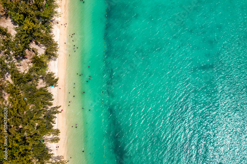 Mauritius beach aerial view of Mont Choisy beach in Grand Baie, Pereybere North. Mont Choisy, public beach in Mauritius island, Africa. Beautiful beach of Mont Choisy in Mauritius, drone aerial view. photo