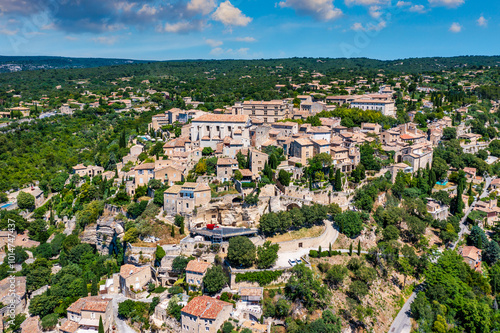 View on Gordes, a small typical town in Provence, France. Discover the stunning hilltop village of Gordes in Provence on a sunny day. Ancient hilltop village of Gordes, Provence, France.