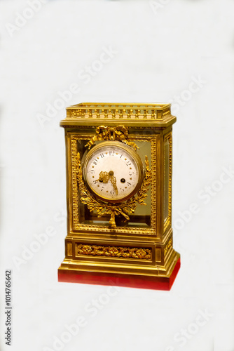 Antique table clock with beautiful yellow inlay , eighteenth century. The items are old technologies. World tourism. photo