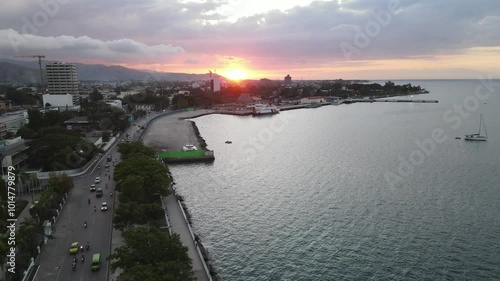 Dili City, Capital of East Timor, seen from the air in the Palacio Beach area, point 0 km of Dili City, before sunset. One of the favorite places in Dili.