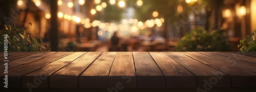 Obraz na płótnie 3. **Evening Glow:** Depict an empty wooden table at dusk, softly illuminated by enchanting bokeh lights. The hazy outlines of an outdoor cafe filled with patrons enjoying dinner create a magical w salonie
