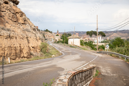 a paved road entering Sastago, province of Zaragoza, Aragon, Spain photo