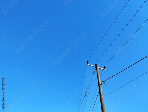 Low angle view electricity pylon against clear sky, Subang, Indonesia