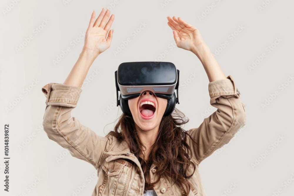 A person wearing a virtual reality headset, hands raised in excitement A person wearing a virtual reality headset, hands raised in excitement