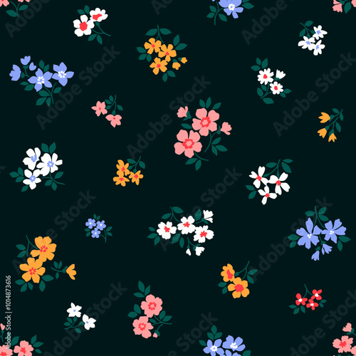 Beautiful seamless floral pattern. Ditsy style background of small flowers. Small colorful blooming flowers scattered over a black background. Stock vector for printing on surfaces and web design.