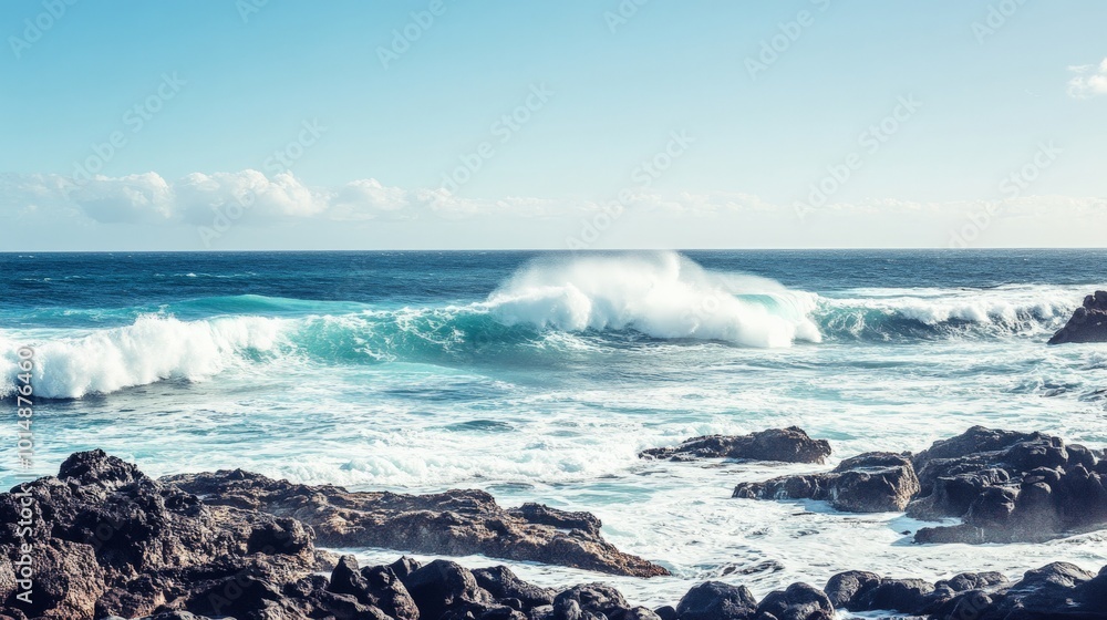 Fototapeta premium Majestic Waves Crashing Against Rugged Coastal Rocks