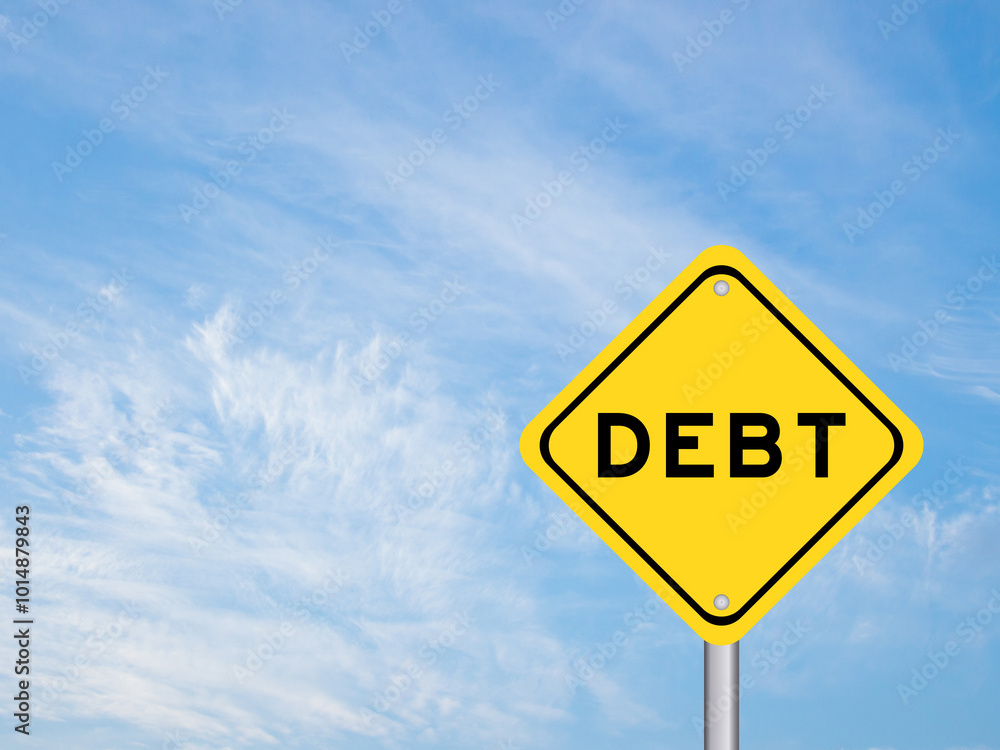Yellow transportation sign with word debt on blue color sky background Yellow transportation sign with word debt on blue color sky background