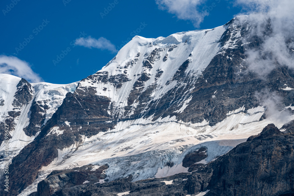 Glaciers in Switzerland - Berner Oberland, Eiger mountain peak, as seen from Gimmewald, Swiss Alps Glaciers in Switzerland - Berner Oberland, Eiger mountain peak, as seen from Gimmewald, Swiss Alps