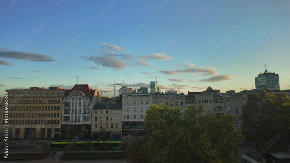 Poznan city center in Poland at sunset in autumn, time lapse. Poznan city center in Poland at sunset in autumn, time lapse.