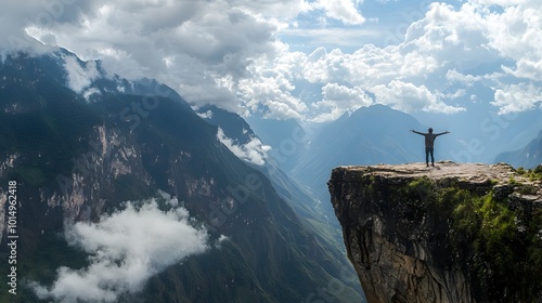 Person Stands on Cliff,Arms Outstretched,Admiring Breathtaking Mountain View and Sky