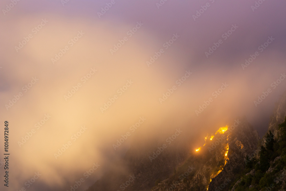 Lights at the cloudy night in the mountains, Montenegro Lights at the cloudy night in the mountains, Montenegro