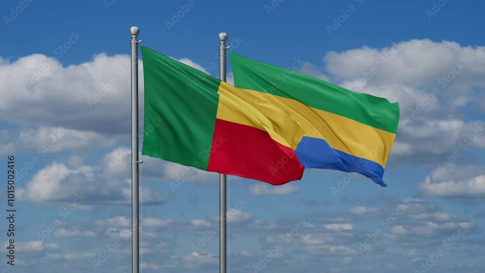 Gabon and Benin flags flying together, video concept of the relationship, two country relations concept Gabon and Benin flags flying together, video concept of the relationship, two country relations concept