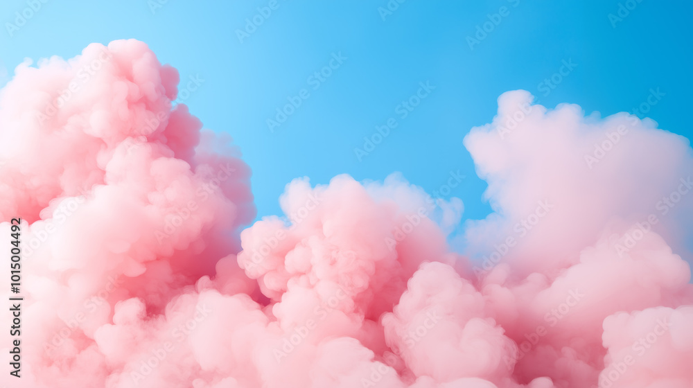 Fluffy pink clouds rolling against a clear blue sky during a vibrant afternoon Fluffy pink clouds rolling against a clear blue sky during a vibrant afternoon
