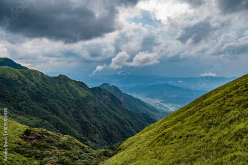 The mountainous landscape of the approaching storm