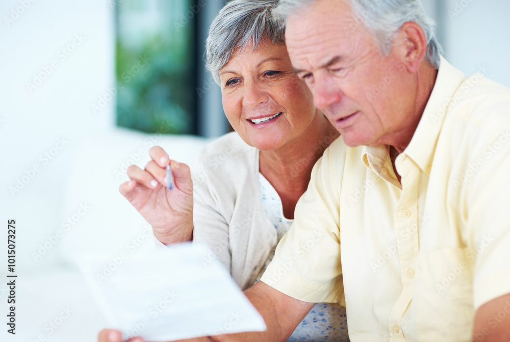 Happy, mature couple and reading with bills for finance, expenses or budget planning on sofa at home. Elderly, man and woman with smile for pension fund, mortgage or financial payments at house Happy, mature couple and reading with bills for finance, expenses or budget planning on sofa at home. Elderly, man and woman with smile for pension fund, mortgage or financial payments at house
