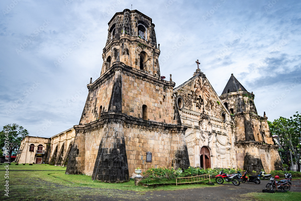Fototapeta premium Miag-ao Church, Iloilo, Philippines. An 18th-century place of worship built by Spanish Catholic missionaries featuring Baroque architecture considered UNESCO world heritage site