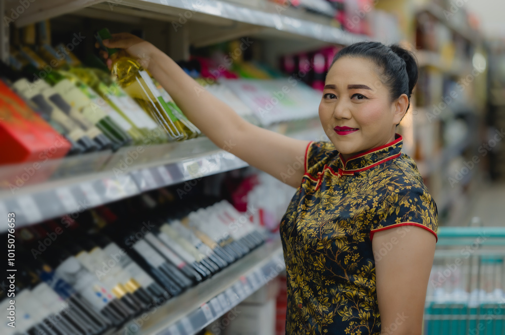 Woman in beautiful traditional outfit selects bottle from shelf in bustling store, combining culture with modern shopping experiences in vibrant marketplace Woman in beautiful traditional outfit selects bottle from shelf in bustling store, combining culture with modern shopping experiences in vibrant marketplace