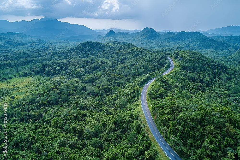 Aerial View of Winding Road through Lush Green Forest and Mountains in Thailand, Vibrant Landscape Photography Aerial View of Winding Road through Lush Green Forest and Mountains in Thailand, Vibrant Landscape Photography