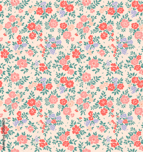 Beautiful floral pattern in small abstract flowers. Small light colorful flowers. Ivory background. Ditsy print. Floral seamless background. Elegant template for fashion prints.