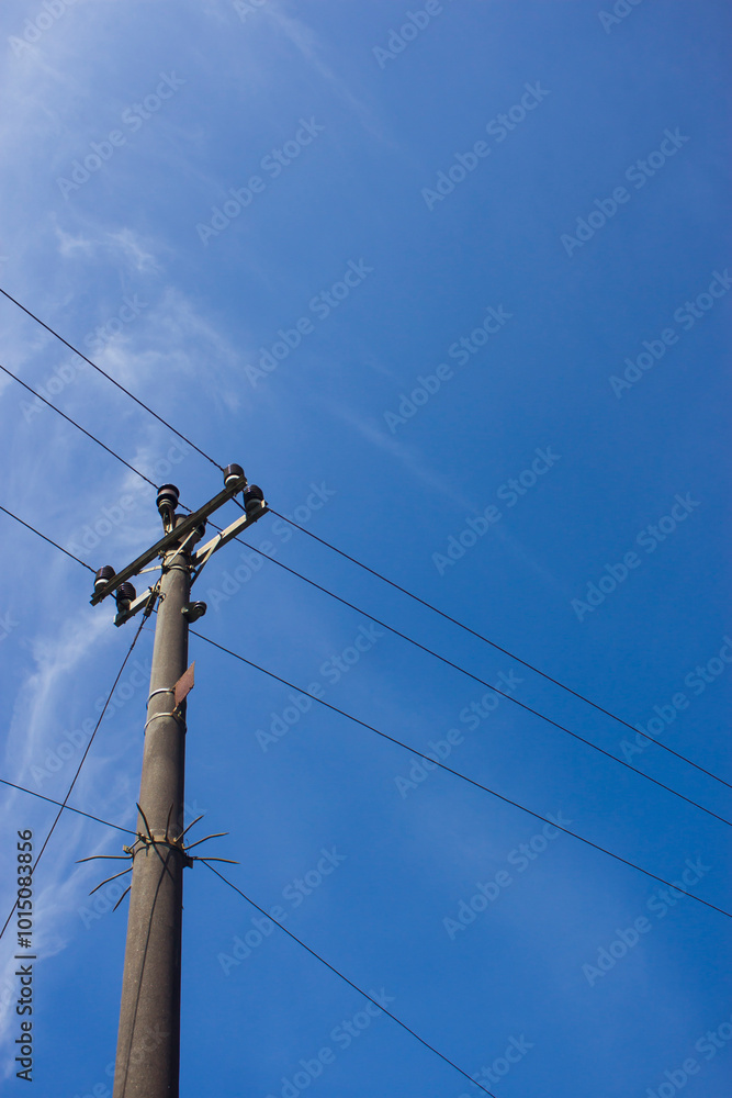 electric pole on the side of the road with a view of the blue sky
electric pole on the side of the road with a view of the blue sky