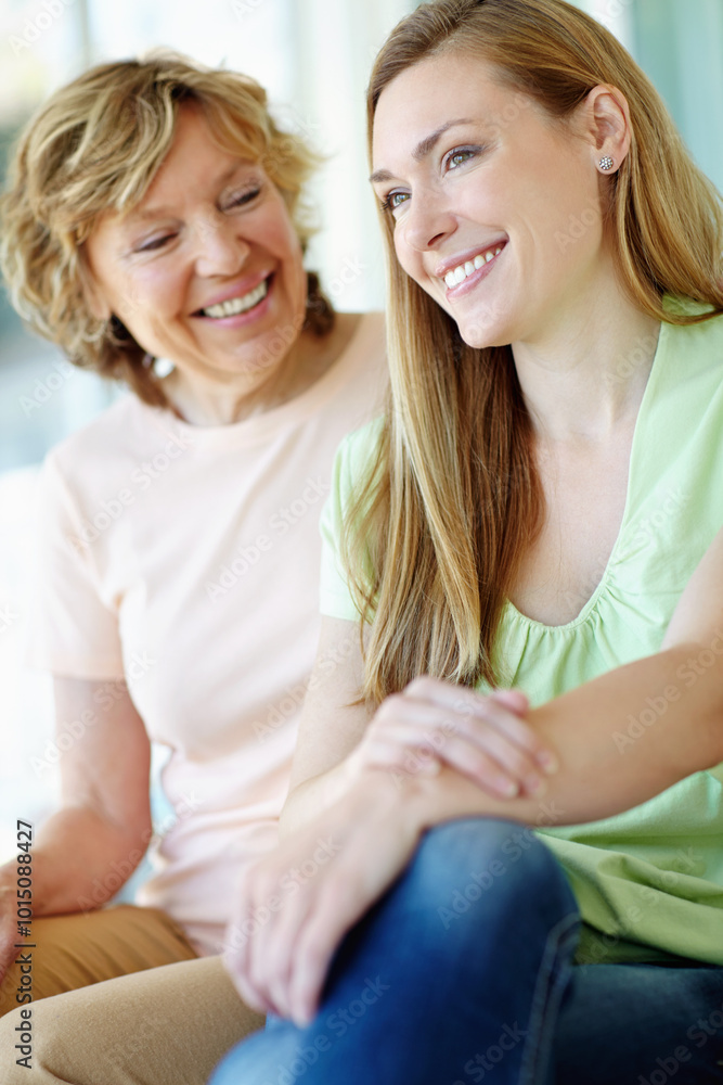 Bonding, mature mother and daughter in home with smile, morning fun and care on couch in living room together. Relax, senior mom and girl on sofa with love, support and happy family in apartment