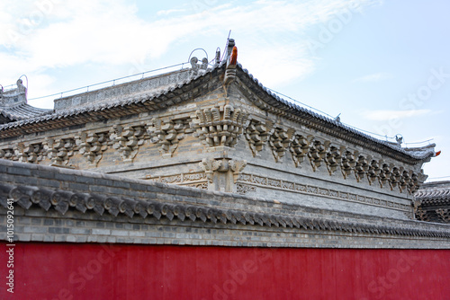 China Shanxi Taiyuan City Yongzuo Temple also known as the Twin Pagodas Temple, blue sky, white clouds and sunlight Ancient Architecture photo