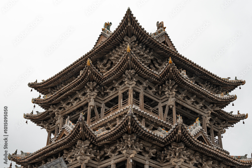 Asian Chinese historical tourist attractions, Feiyun Tower on a rainy day, a pure wooden tower pavilion ancient building. The word Asian Chinese historical tourist attractions, Feiyun Tower on a rainy day, a pure wooden tower pavilion ancient building. The word