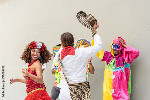 Smiling dancers in colorful costumes enjoying carnival celebration