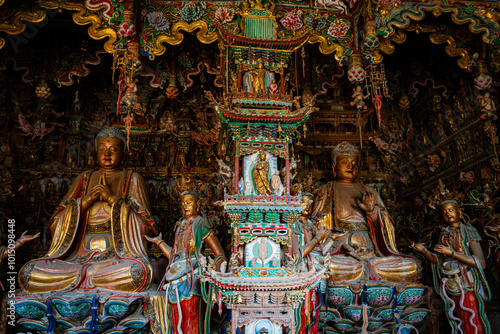 Stone statue of cross-legged Bodhisattva in Cave 18 of Yungang Grottoes, Datong, Shanxi Province