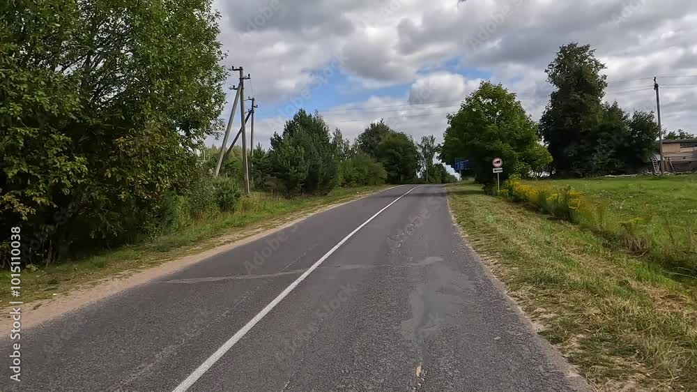 Road view on a summer day. Highways and cars, roadside and white road line markings. Road view on a summer day. Highways and cars, roadside and white road line markings.