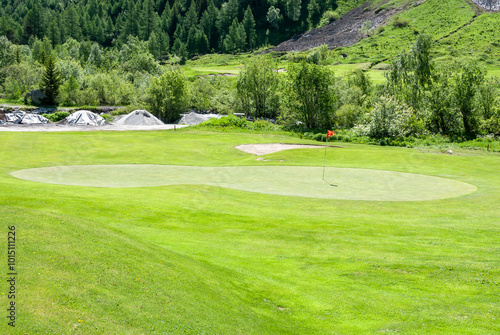 Golf course with red flag