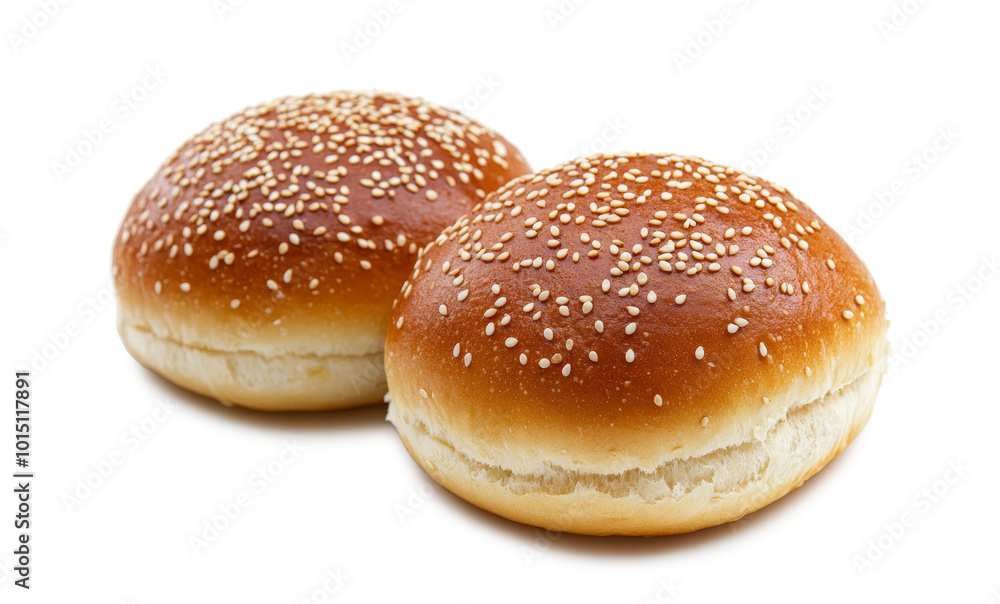 Two sesame seed burger buns isolated on a white or clear background. Two sesame seed burger buns isolated on a white or clear background.