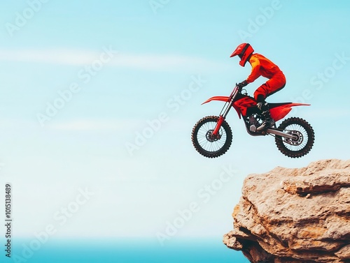 Motocross biker in mid-air performing a trick above a rocky cliff, intense focus, motocross, trick, cliff