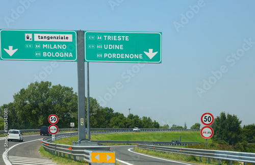 fork on the Italian highway take the left for Milan or Bologna or the right to head towards Trieste Udine Pordenone in northern Italy photo