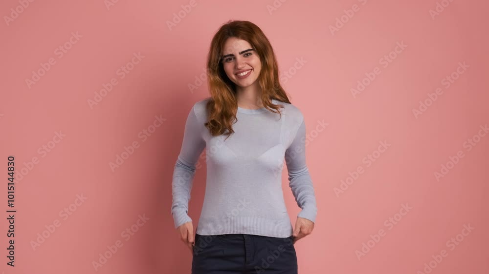 Confident young woman in casual outfit smiling in studio Confident young woman in casual outfit smiling in studio