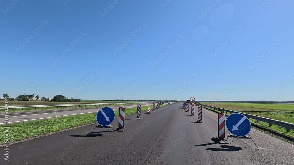 Road view on a summer day. Highways and cars, roadside and white road line markings. Road view on a summer day. Highways and cars, roadside and white road line markings.